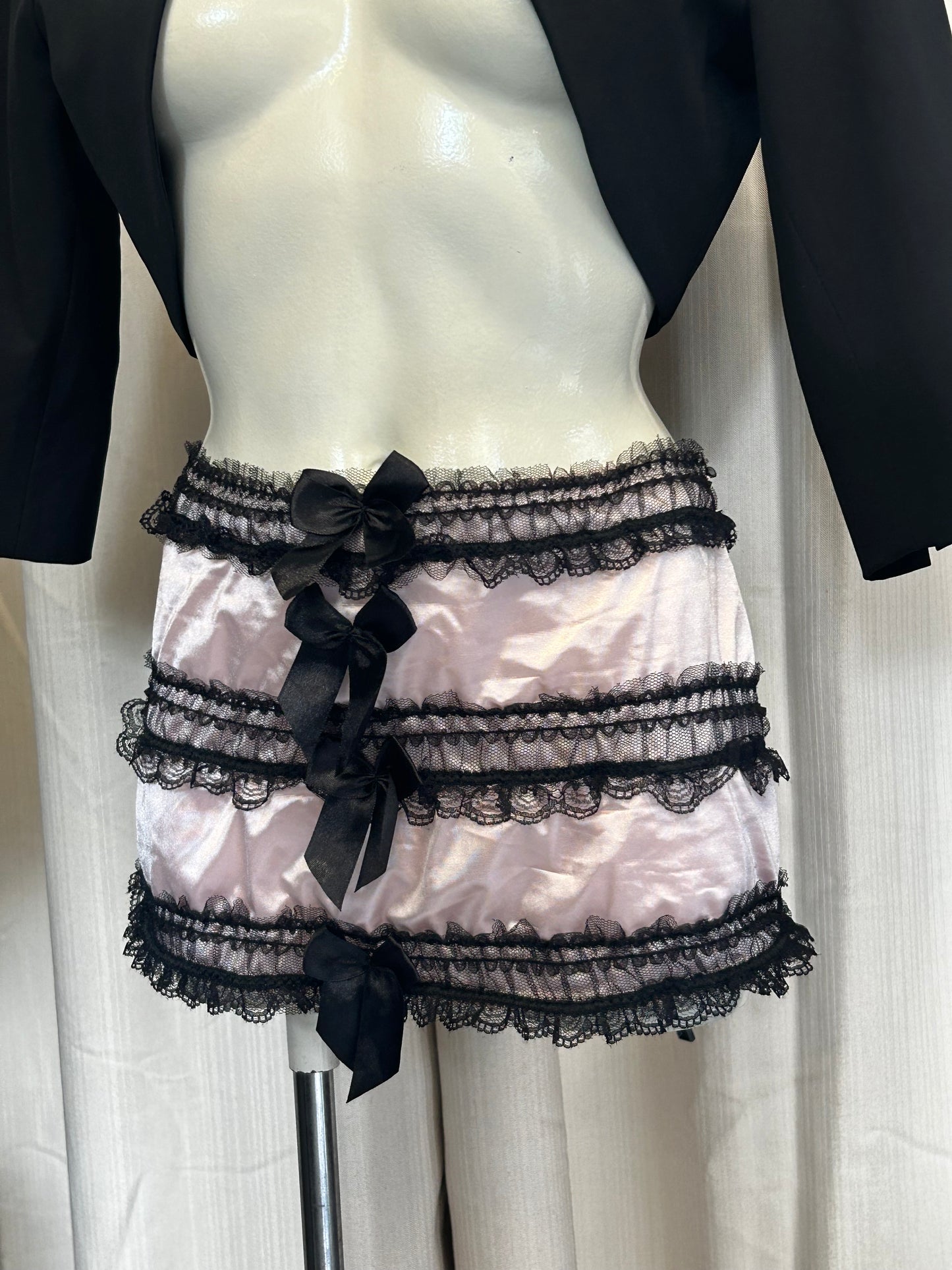 Pink lace mini skirt