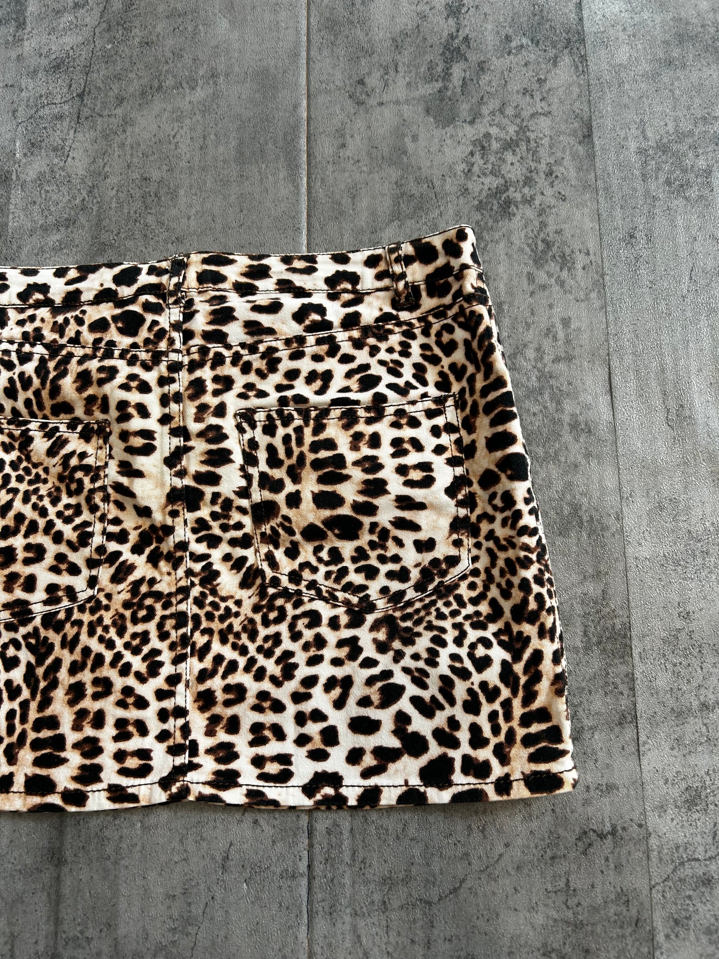 Animal print mini denim skirt