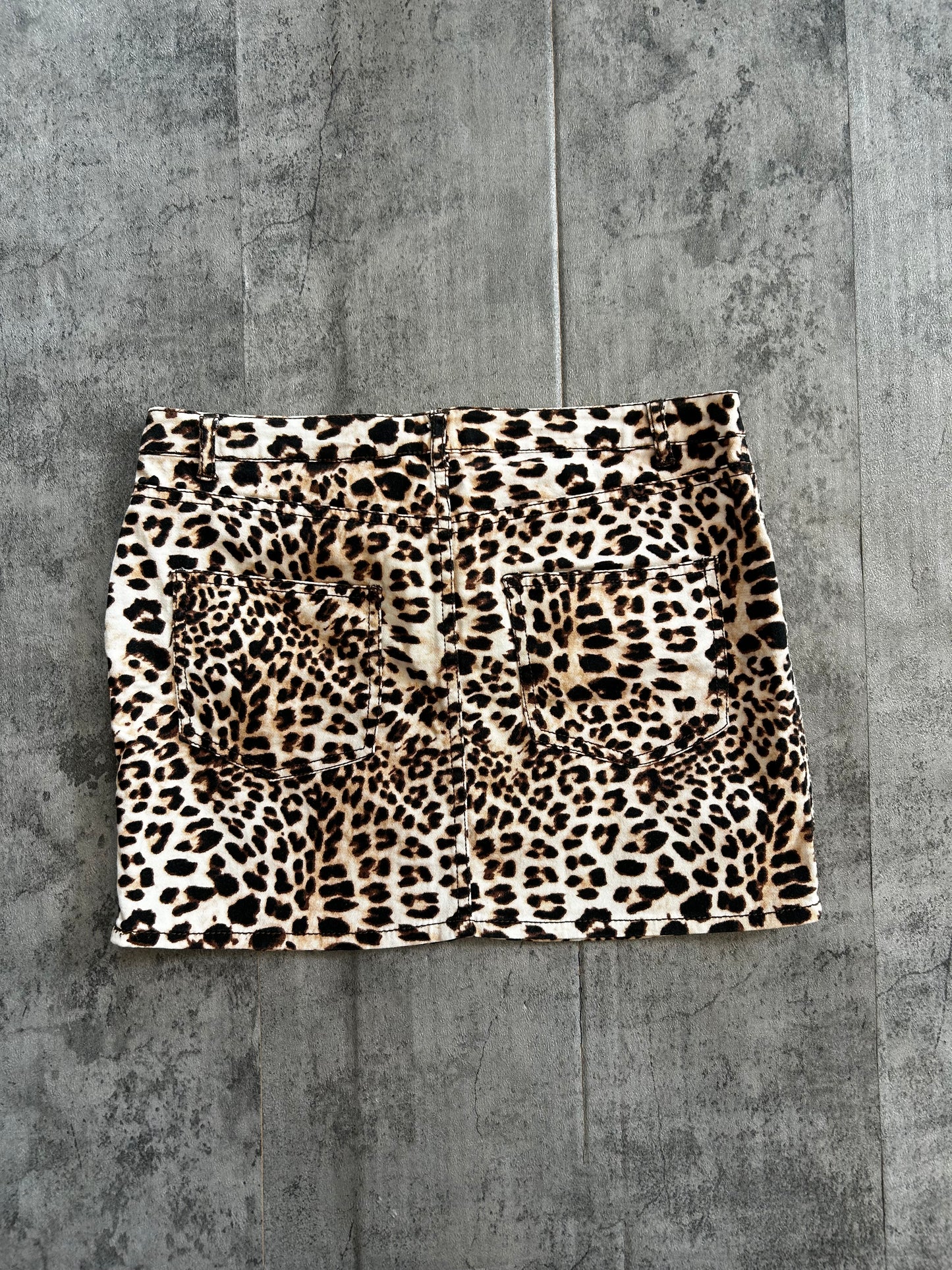 Animal print mini denim skirt