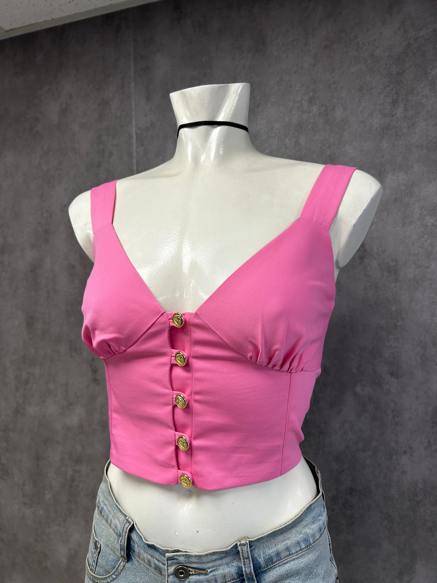 Pink crop top with gold buttons
