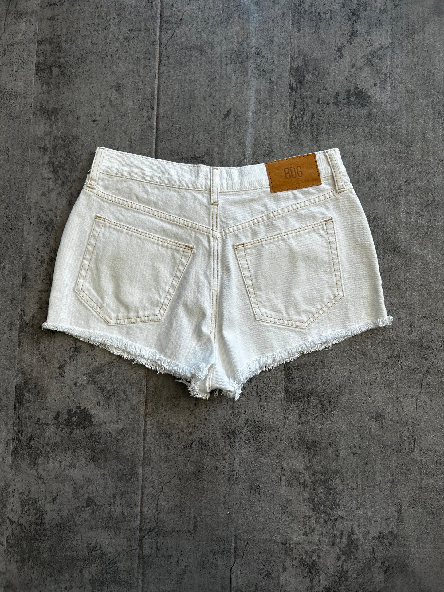 BDG white denim shorts